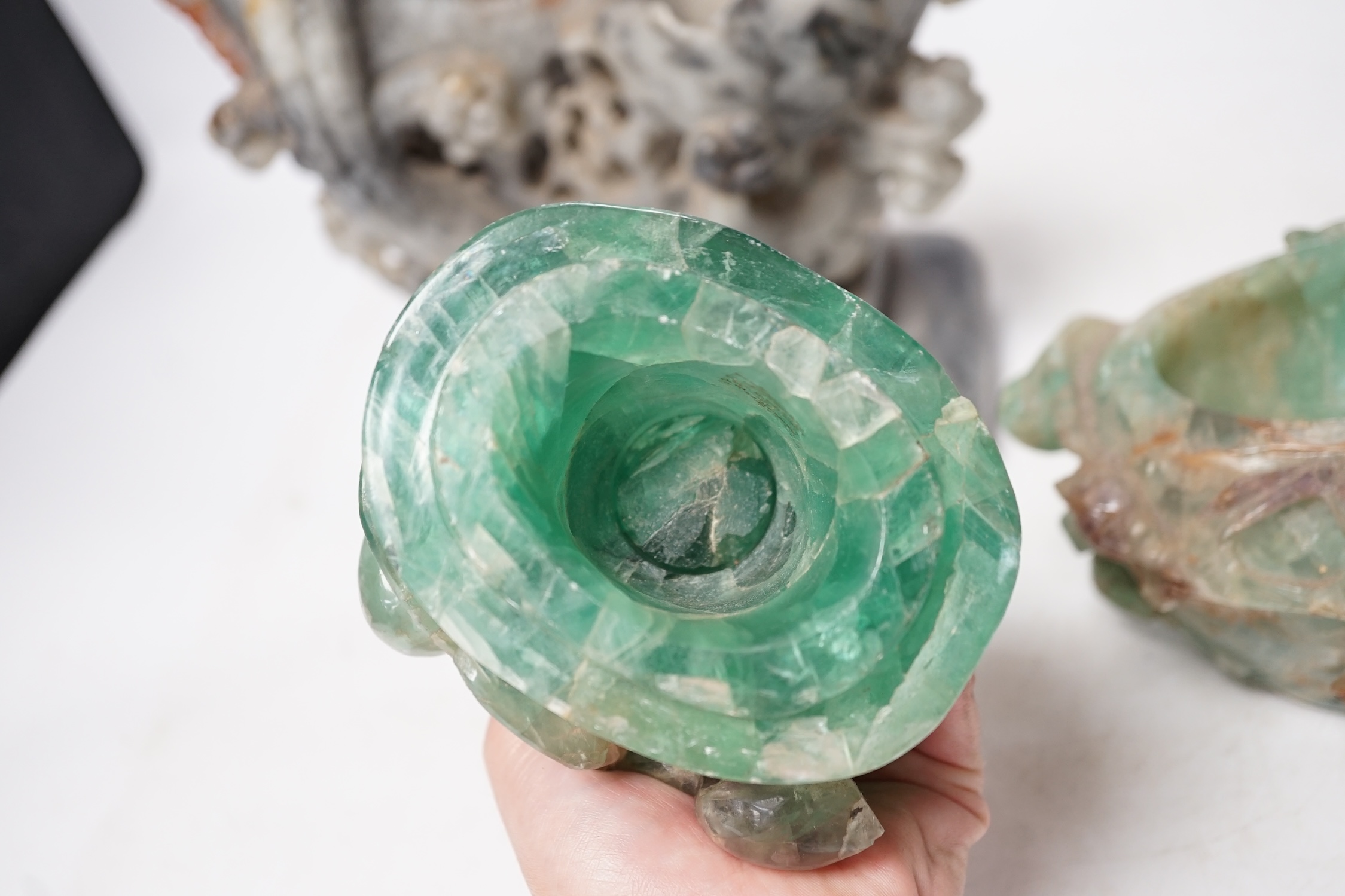 A Chinese carved soapstone figure of a leaping carp and a green quartz pot and cover, tallest 29.5cm high. Condition - fair